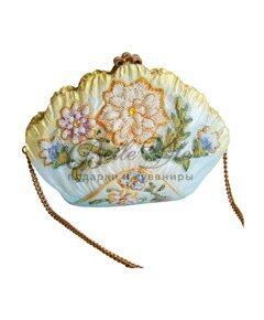 Ажурная светло голубая сумочка с цветочками и желтыми камешками купить оптом в Симферополе